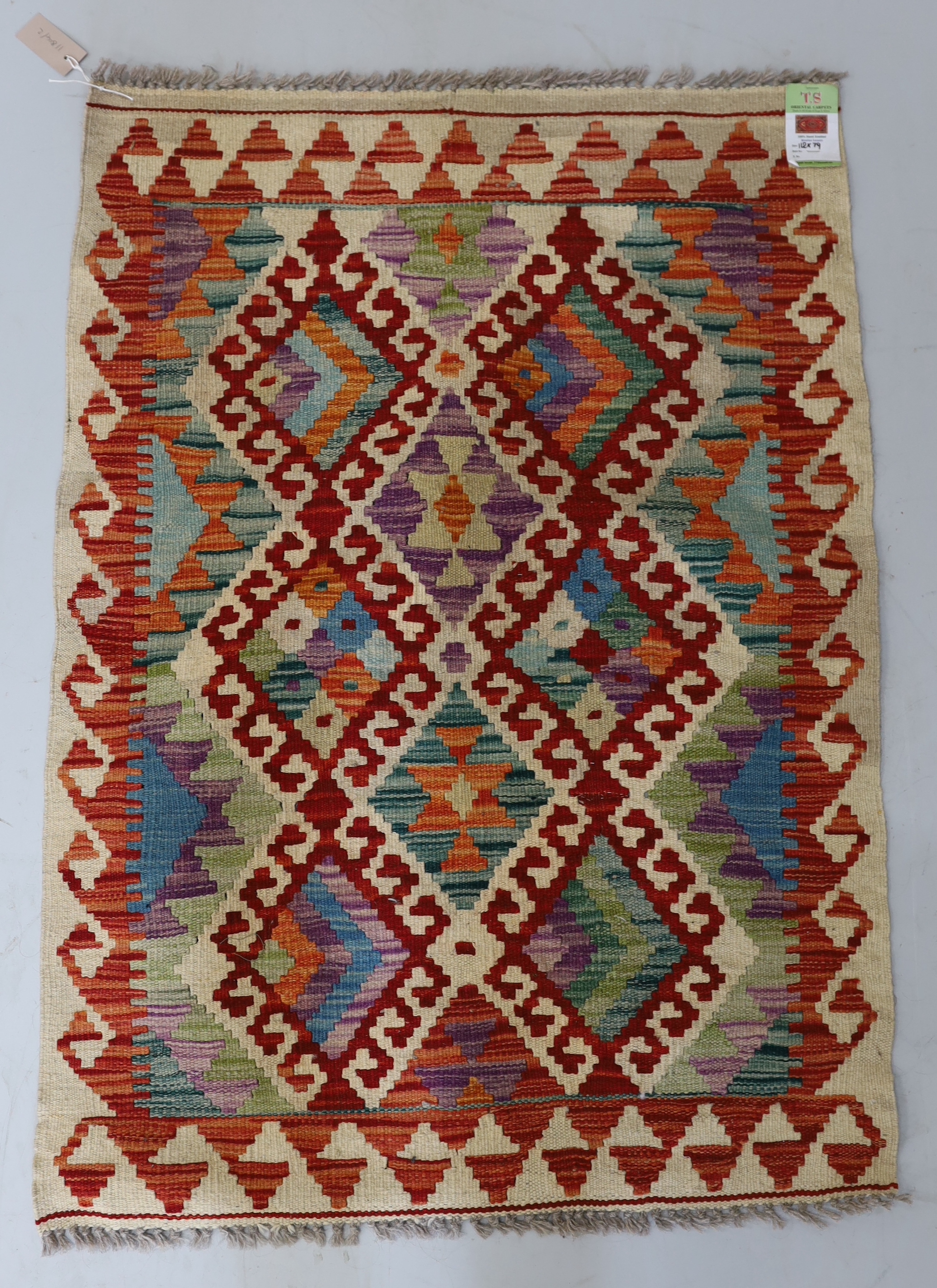 An Anatolian Kilim polychrome rug, 100 x 78cm